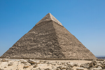 Obraz na płótnie Canvas The Great Pyramids of Giza near the ruins of a temple in Giza, Egypt
