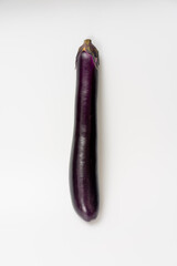 Purple eggplant on white background