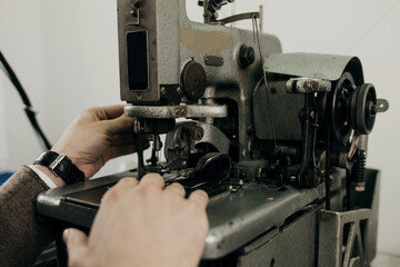 Seamstress sews clothes