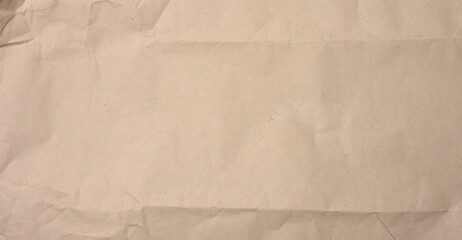 crumpled blank sheet of brown wrapping kraft paper