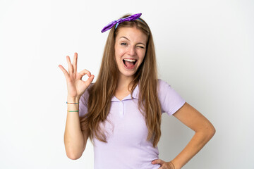 Young caucasian woman over isolated background showing ok sign with fingers