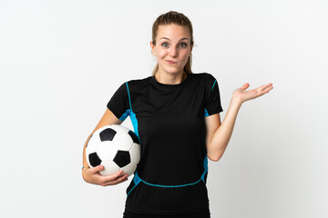 Young football player woman isolated on white background having doubts while raising hands