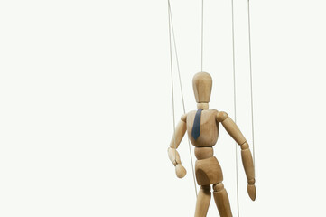 Control. Marionette on the strings. Business concept.