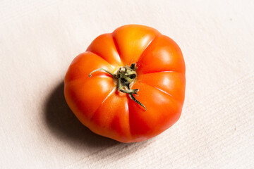 Uncooked raw red tomato