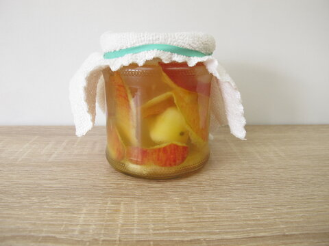 Preperation of homemade apple cider vinegar in a jar