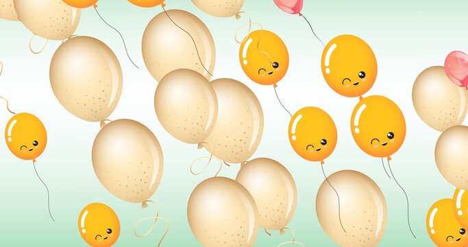 Composition of multiple yellow balloons with faces on green background