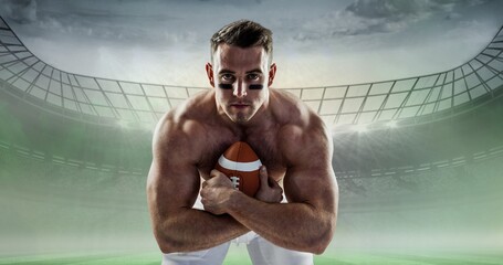 Composition of male rugby player with ball over rugby field