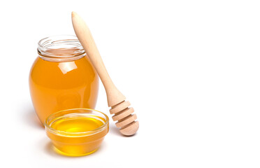 honey dipper and honey in jar