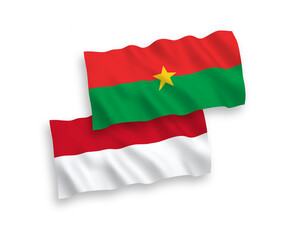 Flags of Indonesia and Burkina Faso on a white background
