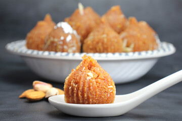 Besan ke ladoo or Motichur ke ladoo or Modak made from Chickpea flour,desi ghee and sugar during festival season like Diwali nad Ganesh chaturthi.