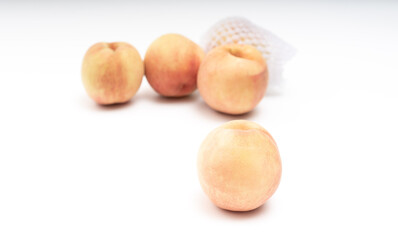 Fresh peach on white background