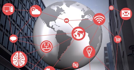 Network of digital icons over globe against tall buildings in background