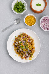 Aloo Tikki or Cutlet or Aloo Patties  dipped in Chickpea curry