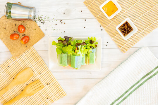 Crab stick salad rolls with thousand island and sesame soy sauce salad dressing.

