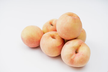 Fototapeta na wymiar Fresh peach on white background