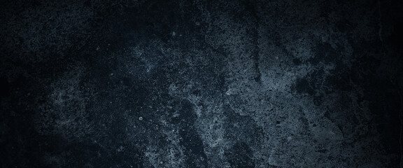 Fototapeta na wymiar Scary dark walls, slightly light black concrete cement texture for background