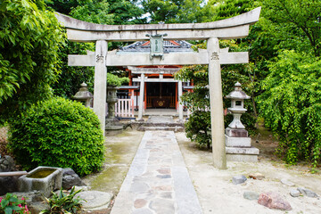 Fushimi Inari Taisha Shrine in Kyoto, Japan with beautiful red gate and japanese garden. Red Torii...