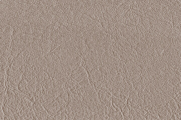 Abstract leather textured on grey-brown background.