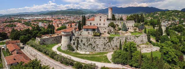 Fototapeta na wymiar Beautiful panoramic view from a drone to the medieval castle of Brescia city. Lombardy, Italy