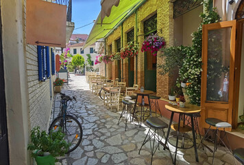 Fototapeta na wymiar preveza city buildings alleys taverns in the city in summer noon, greece