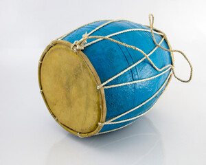 A traditional musical instrument drum called dhol which is popular in Indian and Bangladeshi festivals.