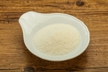 White sugar in the bowl