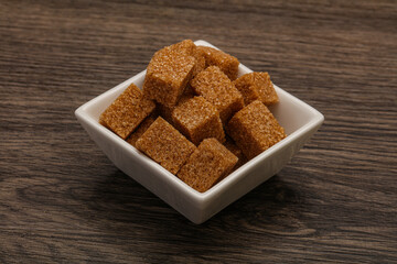 Cane sugar cubs in the bowl