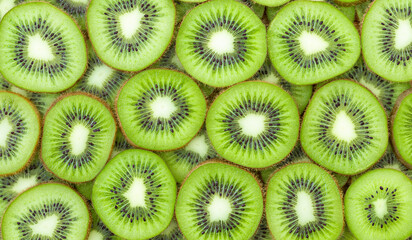 Bright background with slices of green kiwi