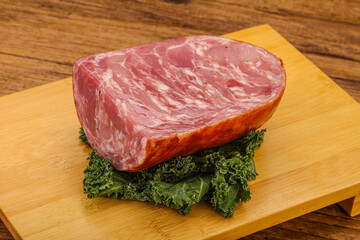 Beef ham piece over board
