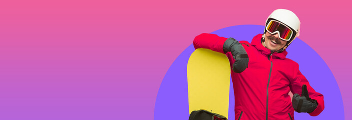 Male snowboarder with skiing gear in bright ski suit isolated on gradient pink purple background