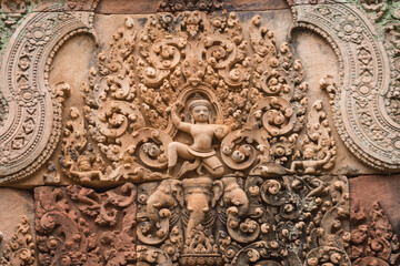 The sandstone carvings of Banteay Srei, one of Cambodia's most beautiful Khmer castles.