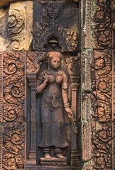 The sandstone carvings of Banteay Srei, one of Cambodia's most beautiful Khmer castles.