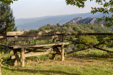 Fototapeta na wymiar Beautiful, wooden bench in the mountains (Central Macedonia, Greece)