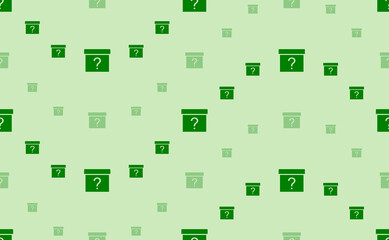 Seamless pattern of large and small green gift box with a question symbols. The elements are arranged in a wavy. Vector illustration on light green background
