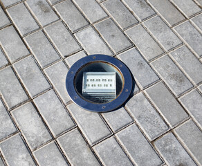 outdoor diode floodlight built into the tile, close-up. Illumination