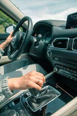Obraz premium rental car travel concept view from inside steering wheel