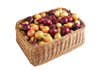Multicolored yellow and red onions in a wicker basket on a white background, isolate, vegetable