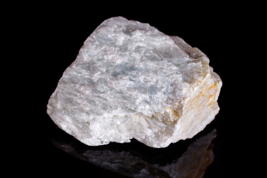 Macro mineral stone Talc on black background