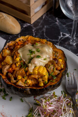 pumpkin stuffed with corn and cheese