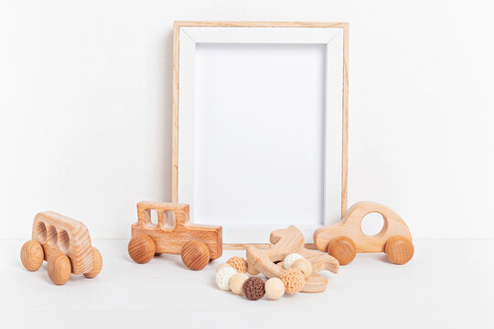 Eco Fiendly Child Wooden Toys And Mockup Frame In Baby Room Interior