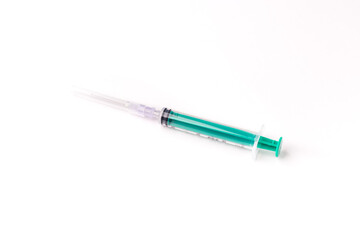 Fototapeta premium Plastic Syringe isolated stock image on texture background.