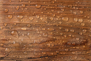 Beautiful old wooden surface, covered with raindrops. Beautiful background. Top view.