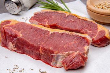 fresh raw piece of beef meat, striploin steak Marbled piece of meat Australia Grade A 

