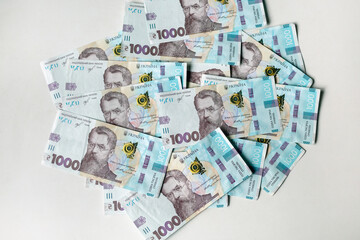 Ukrainian money. Background of the thousand hryvnia banknotes. Close up finance background.