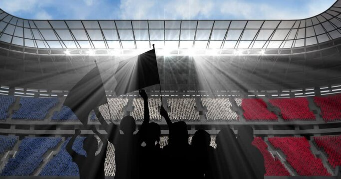 Animation of silhouettes of sports fans cheering with french flag over sports stadium