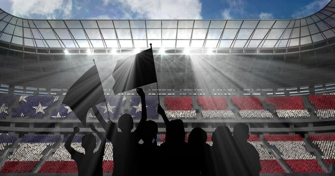 Animation of silhouettes of sports fans cheering with american flag over sports stadium