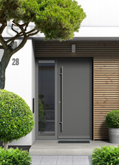 Eingang mit Haustür mit Seiten eines modernen Einfamilienhauses mit Holzvertäfelung und Vorgarten - obrazy, fototapety, plakaty