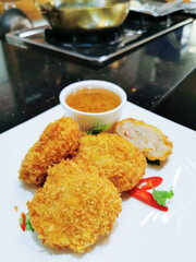 deep fried prawn cakes, just finished cooking, still on the table in the kitchen
