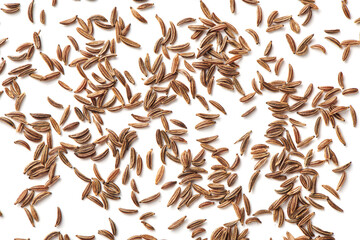 Close up caraway seeds. Dried caraway seeds isolated on white background. Pile of cumin seeds. Seasoning for food cooking of worldwide kitchen. Top close up view.
