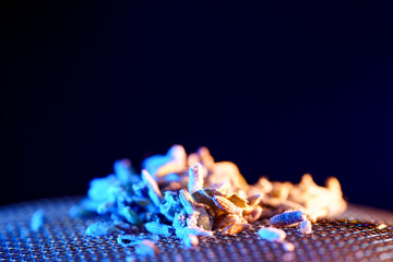 Spices for smoking in the studio photographed with smoke and dark background